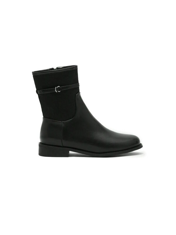 Black buckle-strap flat mid-calf boots, side view